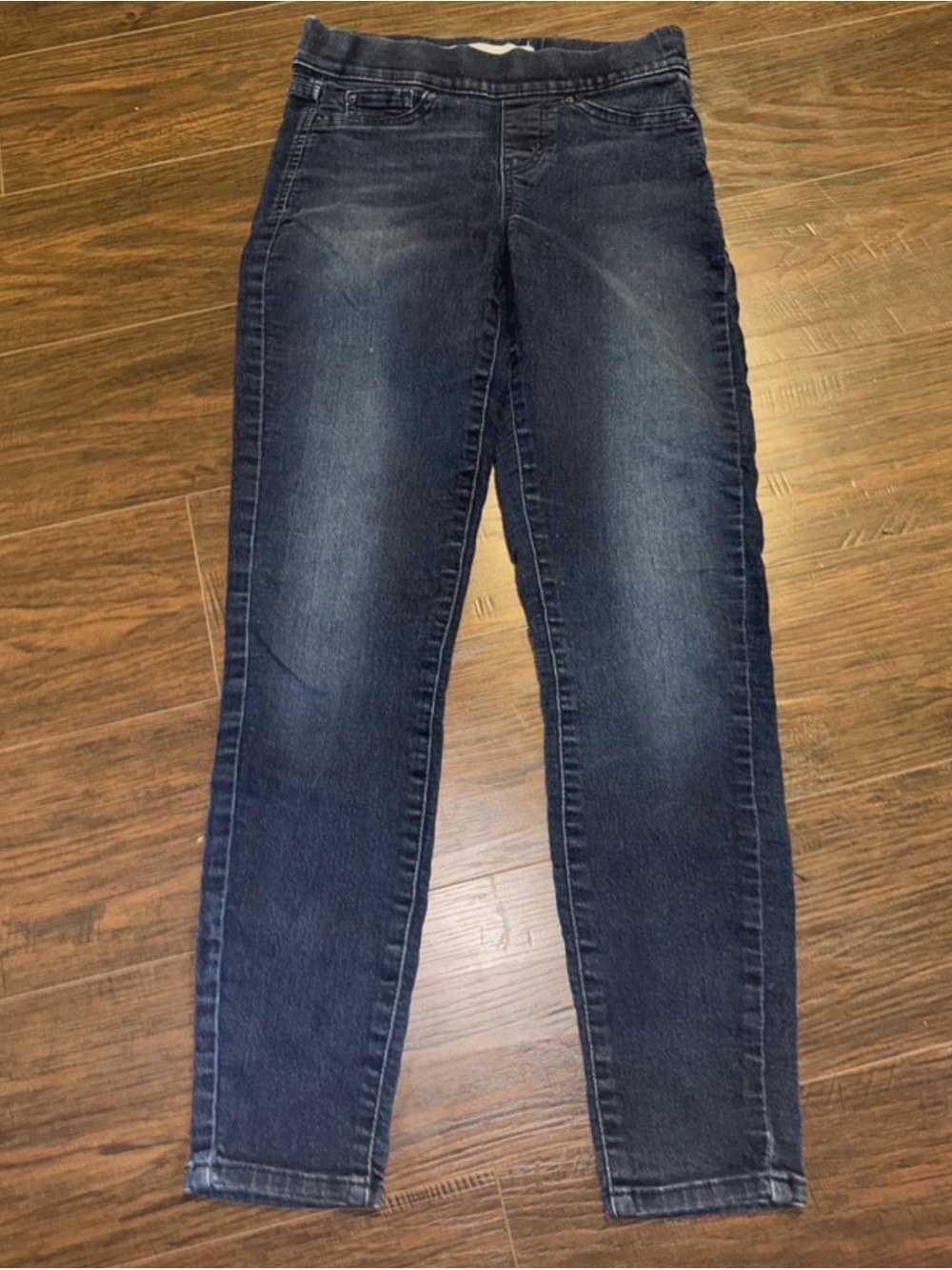 Women’s Dark Blue jeans and pink bag with black bows